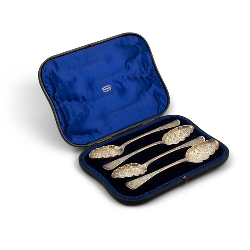 597 - A SET OF FOUR GEORGE IV SILVER GILT BERRY SPOONS,  London 1827, mark possibly that of William Chawne... 