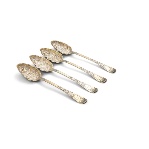 597 - A SET OF FOUR GEORGE IV SILVER GILT BERRY SPOONS,  London 1827, mark possibly that of William Chawne... 