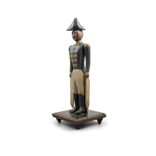 605A - A CARVED AND POLYCHROME TIMBER NAPOLEON WHIRLIGIG, 19TH CENTURY  modelled in uniform with tricorn ha... 