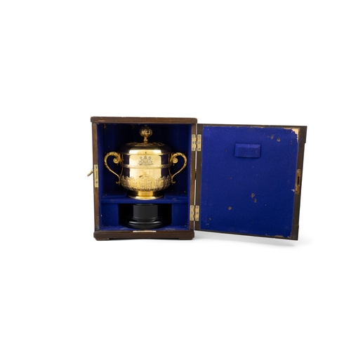 611 - THE WATERLOO PURSE 1926,  A silver-gilt trophy cup in the form of an 17th century porringer and cove... 