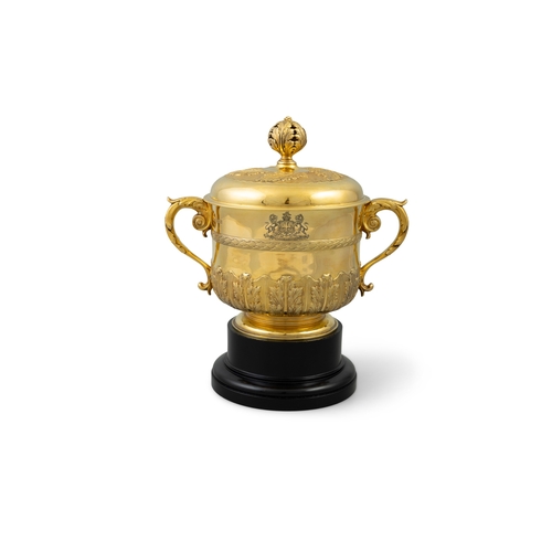 611 - THE WATERLOO PURSE 1926,  A silver-gilt trophy cup in the form of an 17th century porringer and cove... 