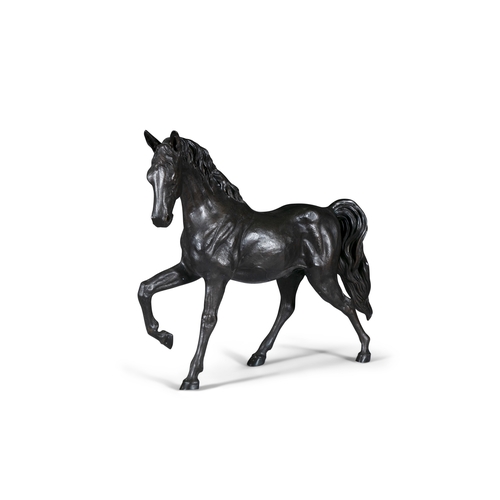 619 - A LARGE STRIDING BRONZE HORSE  68cm high, 90cm long