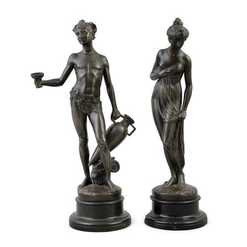 621 - A PAIR OF CAST BRONZE FIGURES  of Venus and Bacchus, raised on stepped black marble bases (1 damaged... 