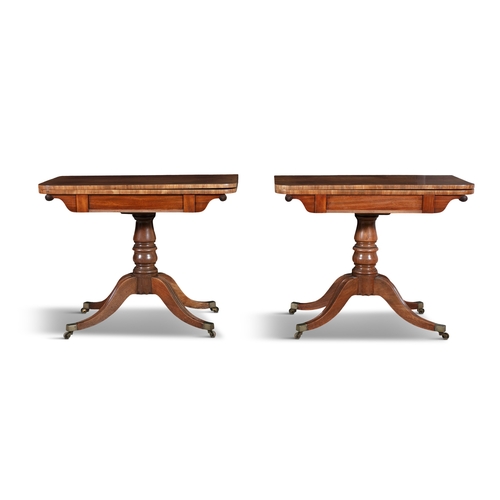 627 - A PAIR OF VICTORIAN MAHOGANY FOLD OVER TEA TABLES,  each of rectangular form with rounded corners an... 