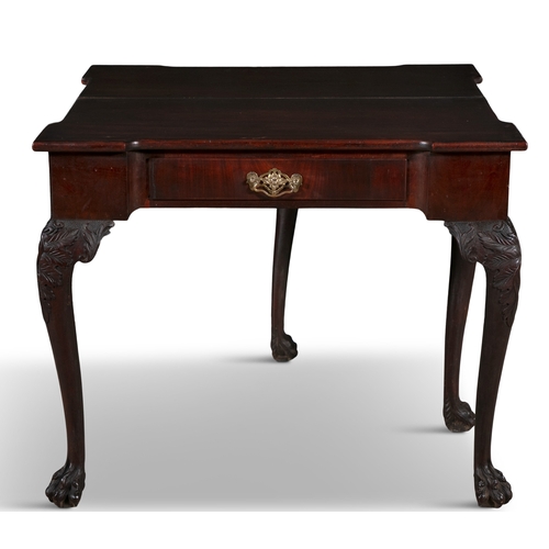 628 - AN IRISH GEORGE III FOLD OVER MAHOGANY TEA TABLE,   solid panel top with outset corners, with single... 