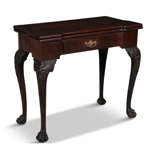 628 - AN IRISH GEORGE III FOLD OVER MAHOGANY TEA TABLE,   solid panel top with outset corners, with single... 