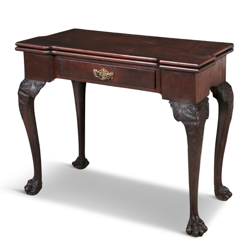 628 - AN IRISH GEORGE III FOLD OVER MAHOGANY TEA TABLE,   solid panel top with outset corners, with single... 