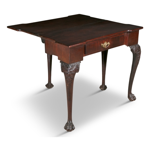 628 - AN IRISH GEORGE III FOLD OVER MAHOGANY TEA TABLE,   solid panel top with outset corners, with single... 