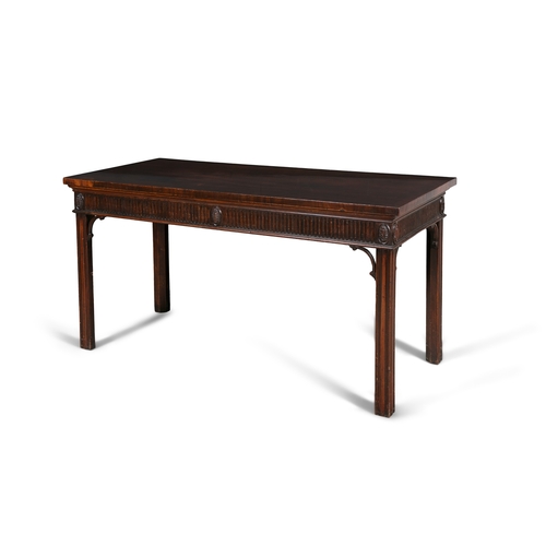 637 - A GEORGE III MAHOGANY RECTANGULAR SERVING TABLE,   the crossbanded top above a fluted frieze, with c... 