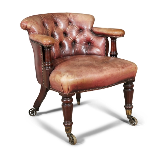 644 - AN EARLY VICTORIAN DEEP TUB BACK CHAIR,  upholstered in button back leather, supported on turned tap... 