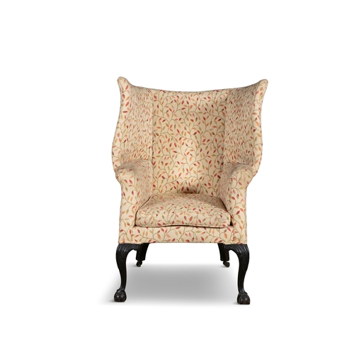 645 - A GEORGE III MAHOGANY TUB BACK UPHOLSTERED ARMCHAIR,   with padded back, scroll arms and squab cushi... 