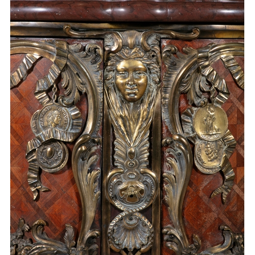 651 - A FRENCH ORMOLU-MOUNTED TULIPWOOD KINGWOOD AND PARQUETRY COMMODE AFTER THE MODEL DESIGNED BY THE SLO... 