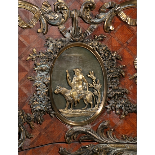 651 - A FRENCH ORMOLU-MOUNTED TULIPWOOD KINGWOOD AND PARQUETRY COMMODE AFTER THE MODEL DESIGNED BY THE SLO... 