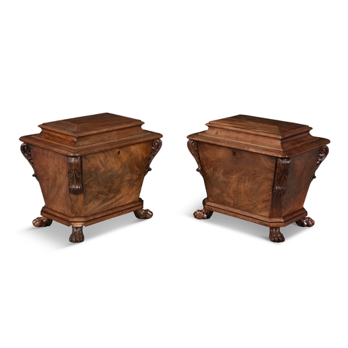 664 - A PAIR OF IRISH WILLIAM IV MAHOGANY WINE COOLERS,  Each of sarcophagus shaped with domed hinged cove... 