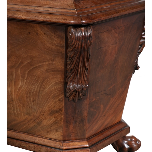 664 - A PAIR OF IRISH WILLIAM IV MAHOGANY WINE COOLERS,  Each of sarcophagus shaped with domed hinged cove... 