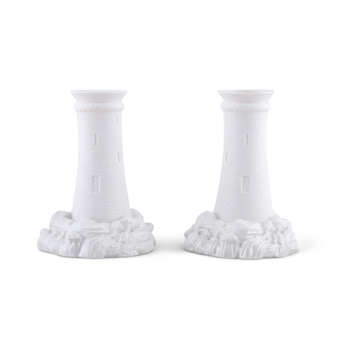 683 - A RARE PAIR OF BELLEEK FIRST PERIOD 'ROUND TOWER' VASES (1863-1891), each with open tops, intricatel... 