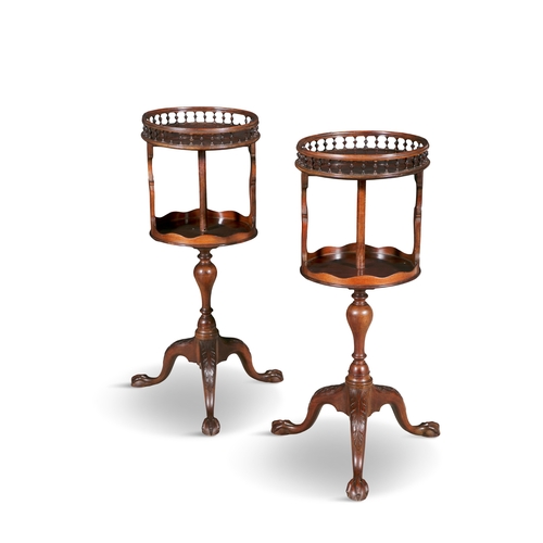 700 - A PAIR OF GEORGIAN REVIVAL MAHOGANY REVOLVING OCCASIONAL TABLES CIRCA 1900,  each of circular form w... 