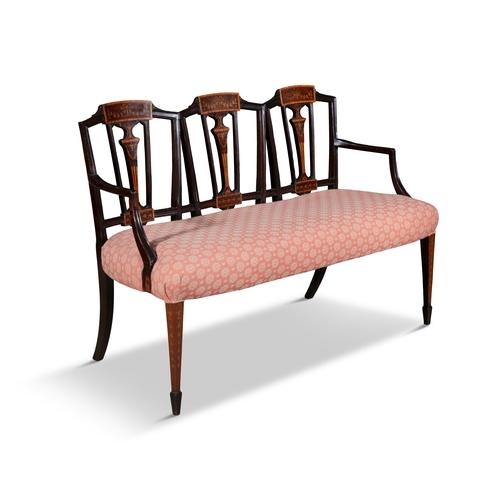 702 - AN EDWARDIAN INLAID MAHOGANY TRIPLE-CHAIR BACK SETTEE,   the open back with three pierced tapering s... 