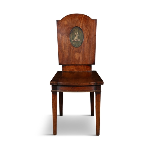 709 - A SET OF FOUR GEORGE III MAHOGANY PANEL HALL CHAIRS,  the solid backs with domed tops, each with pai... 