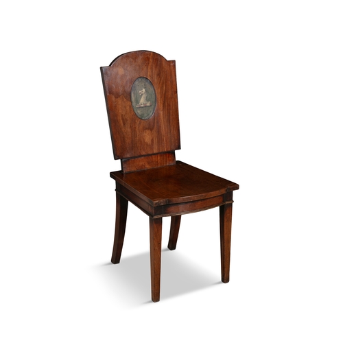 709 - A SET OF FOUR GEORGE III MAHOGANY PANEL HALL CHAIRS,  the solid backs with domed tops, each with pai... 