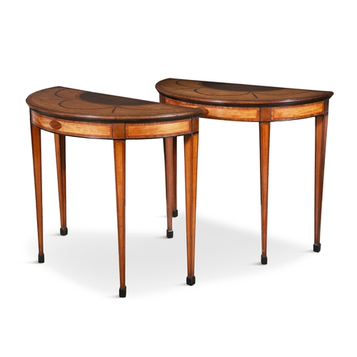 711 - A PAIR OF GEORGE III SATINWOOD HAREWOOD AND MARQUETRY INLAID SEMI-ELLIPTICAL TABLES,  each crossband... 