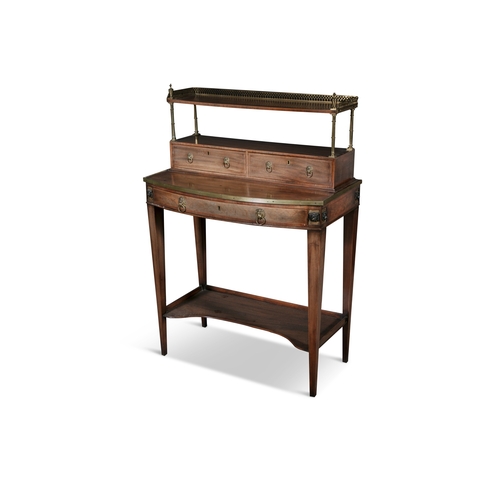 712 - A REGENCY MAHOGANY AND BRASS MOUNTED BONHEUR DE JOUR,  of bowfront rectangular shape, the raised sup... 