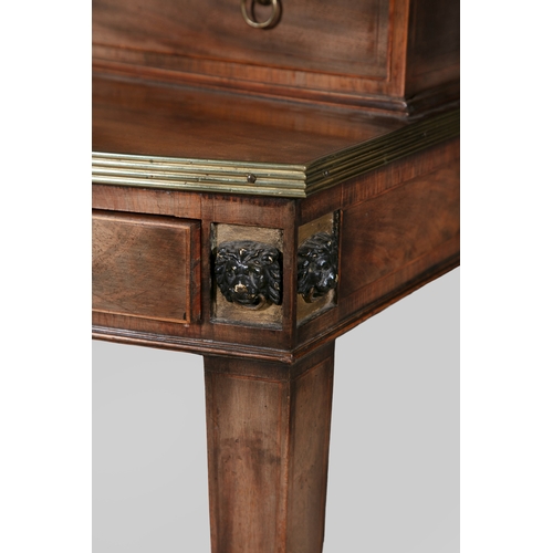 712 - A REGENCY MAHOGANY AND BRASS MOUNTED BONHEUR DE JOUR,  of bowfront rectangular shape, the raised sup... 