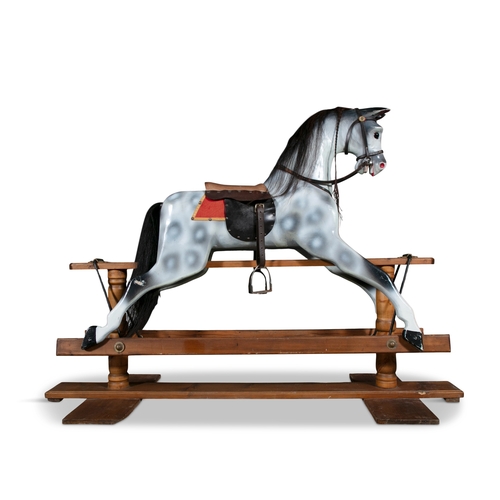 727 - AN EDWARDIAN PAINTED TIMBER ROCKING HORSE,   painted in white and grey tones, with saddle and stirru... 