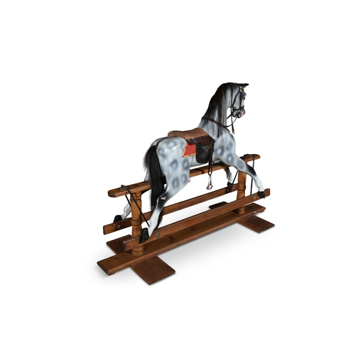 727 - AN EDWARDIAN PAINTED TIMBER ROCKING HORSE,   painted in white and grey tones, with saddle and stirru... 