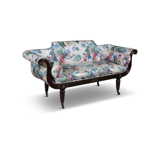 733 - A REGENCY MAHOGANY FRAMED SOFA CIRCA 1815  upholstered in floral fabric, the reeded frame carved wit... 