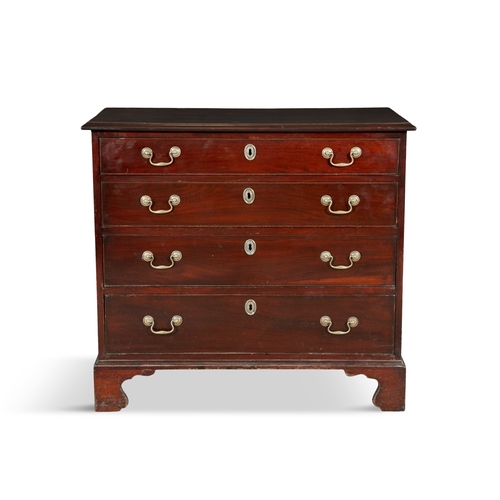 744 - A GEORGE III MAHOGANY COMPACT CHEST OF DRAWERS,   the rectangular top with moulded rim, above an arr... 