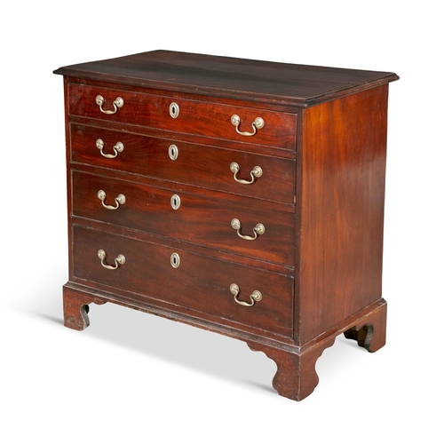 744 - A GEORGE III MAHOGANY COMPACT CHEST OF DRAWERS,   the rectangular top with moulded rim, above an arr... 