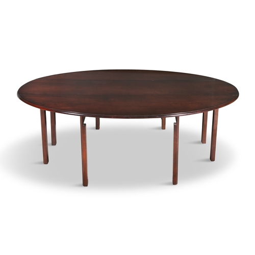 745 - A MAHOGANY LARGE OVAL HUNT TABLE 20TH CENTURY,   having twin drop-leaf sides, moulded and rounded ed... 