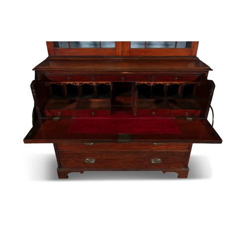 747 - A GEORGE III MAHOGANY SECRETAIRE BOOKCASE,  with plain cornice above twin astragal glazed panel door... 