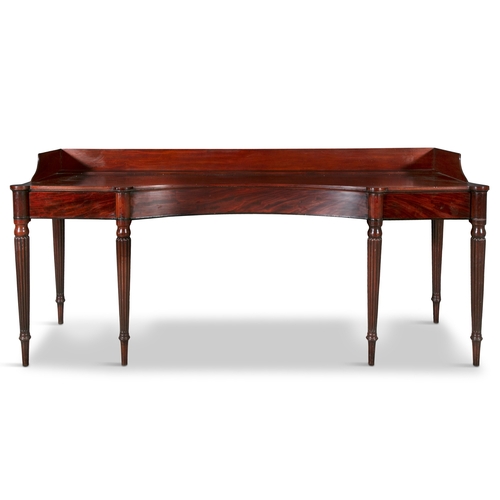 754 - A GEORGE IV MAHOGANY SERVING TABLE CIRCA 1825,  the inverted bowfront top, with three quarter galler... 