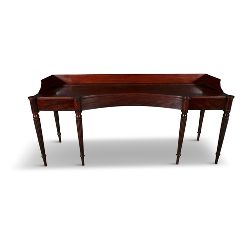 754 - A GEORGE IV MAHOGANY SERVING TABLE CIRCA 1825,  the inverted bowfront top, with three quarter galler... 