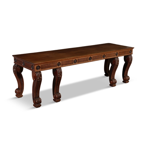 10 - A GEORGE III STYLE 'KENTIAN' MAHOGANY HALL BENCH LATE 19TH CENTURY,   the solid panel seat above a f... 