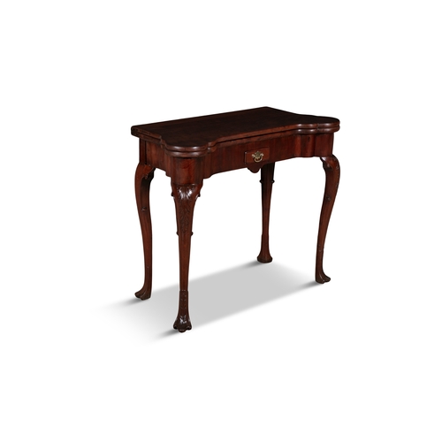 120 - AN IRISH GEORGE II MAHOGANY FOLD TOP TEA TABLE,  the shaped rectangular folding top opening to a pla... 