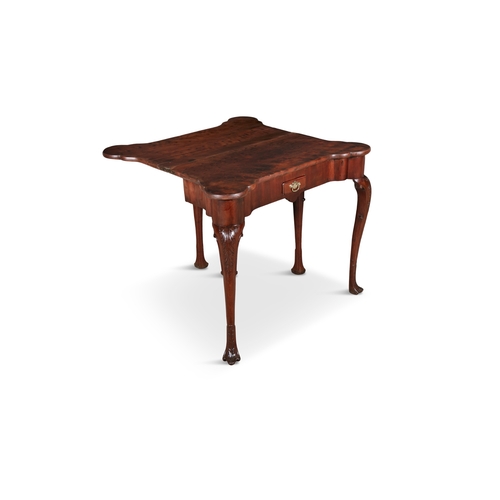 120 - AN IRISH GEORGE II MAHOGANY FOLD TOP TEA TABLE,  the shaped rectangular folding top opening to a pla... 