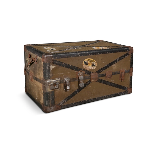 129 - AN EDWARDIAN STRAPWORK BOUND WARDROBE TRAVELLING TRUNK,  opening to two sections, one for hanging, t... 