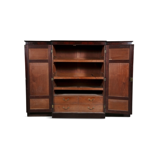 133 - A GEORGE IV MAHOGANY FOUR-DOOR WARDROBE,  of breakfront design, with simple moulded cornice above fi... 