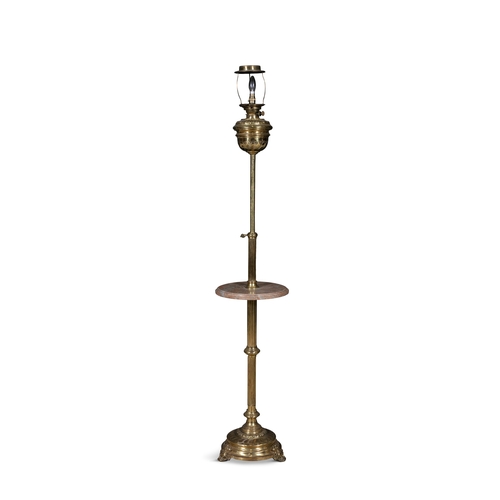 134 - A CONTINENTAL BRASS STANDARD LAMP,   the fluted column centred with a circular rouge marble platform... 