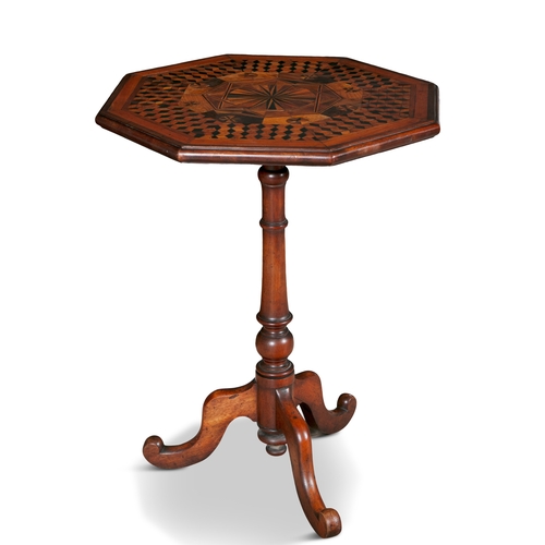 148 - A CONTINENTAL MAHOGANY PARQUETRY AND SPECIMEN WOOD TABLE 19TH CENTURY  the octagonal top with a geom... 