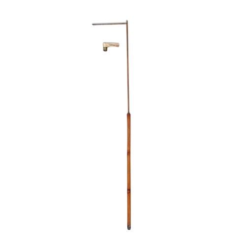 183 - A 'HANDS MEASURE' WALKING STICK,  the angled handle twisting off to reveal internal measuring rod wi... 