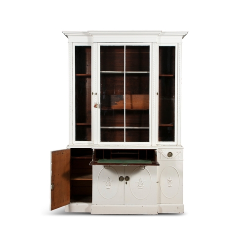 189 - A WHITE-PAINTED BREAKFRONT SECRETAIRE BOOKCASE EARLY 19TH CENTURY,   the moulded cornice above plain... 