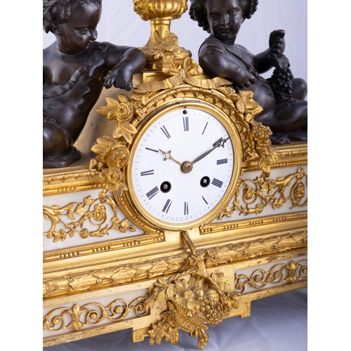 195 - A FRENCH ORMOLU BRONZE THREE-PIECE CLOCK GARNITURE 19TH CENTURY,   the clock cast with opposing cher... 