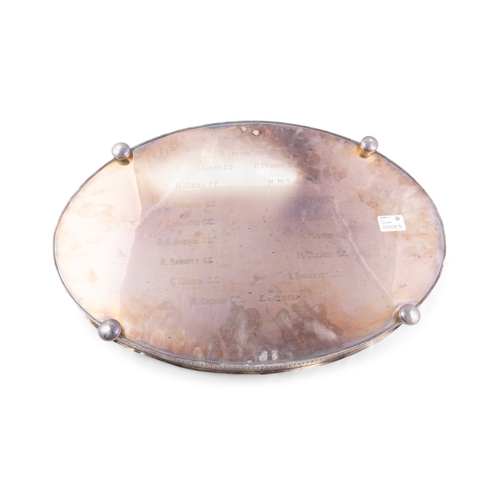 196 - A SILVER PLATED OVAL TWO-HANDLE SERVING TRAY, C. 1940,  engraved with presentation to Rev. John Russ... 