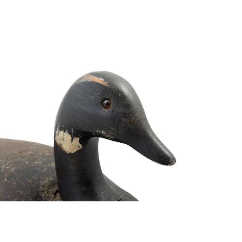 2 - A BROWN PAINTED TIMBER DUCK DECOY,   21cm high, 20cm wide, 44cm long