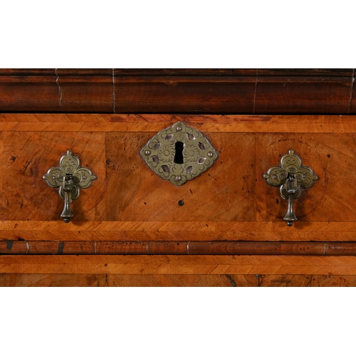 218 - A WILLIAM & MARY WALNUT CHEST ON STAND CIRCA 1700,  the rectangular upper section with moulded corni... 