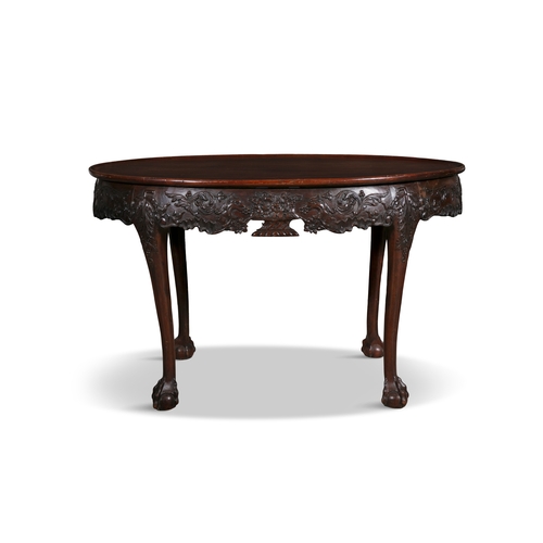 242 - A PAIR OF GEORGE III STYLE MAHOGANY OVAL CENTRE TABLES,  The tray tops with leaf and scroll carved f... 